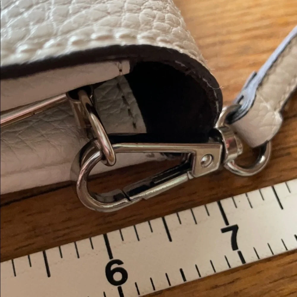 White vegan leather crossbody purse with tassel